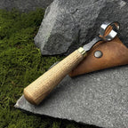 This hand-forged scorpion knife features a carbon steel 52100 blade and comes with a leather case. It’s perfect for bowl, cup carving, spoon