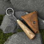 This hand-forged scorpion knife features a carbon steel 52100 blade and comes with a leather case. It’s perfect for bowl, cup carving, spoon