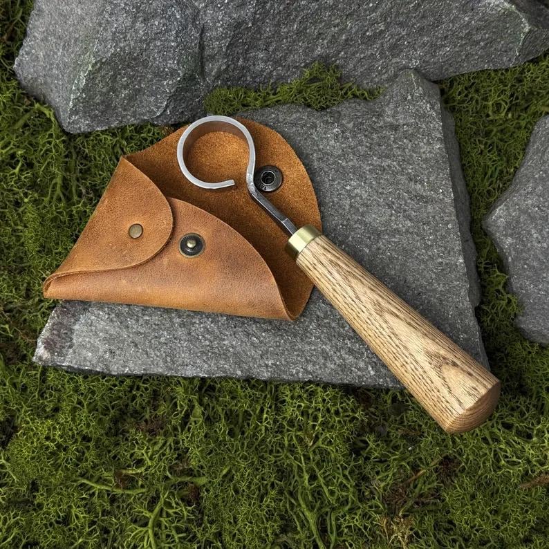 This Scorpion Knife comes with a leather case for carving bowls cups and spoons. It features a hand-forged carbon steel 52100 blade perfect