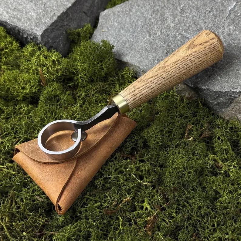 This Scorpion Knife comes with a leather case for carving bowls cups and spoons. It features a hand-forged carbon steel 52100 blade perfect